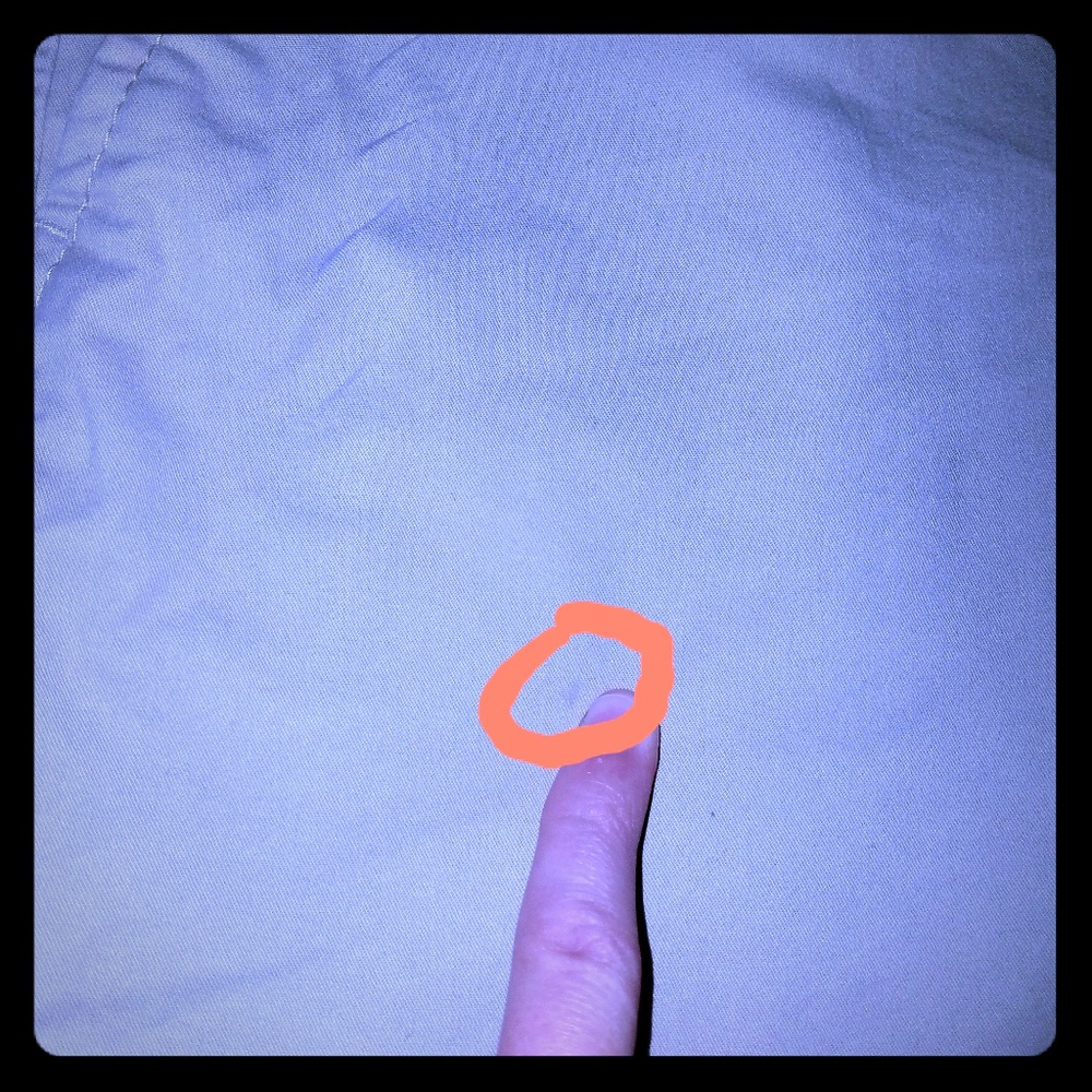 SHOWING VERY TINY MARK FOR COSTUMER